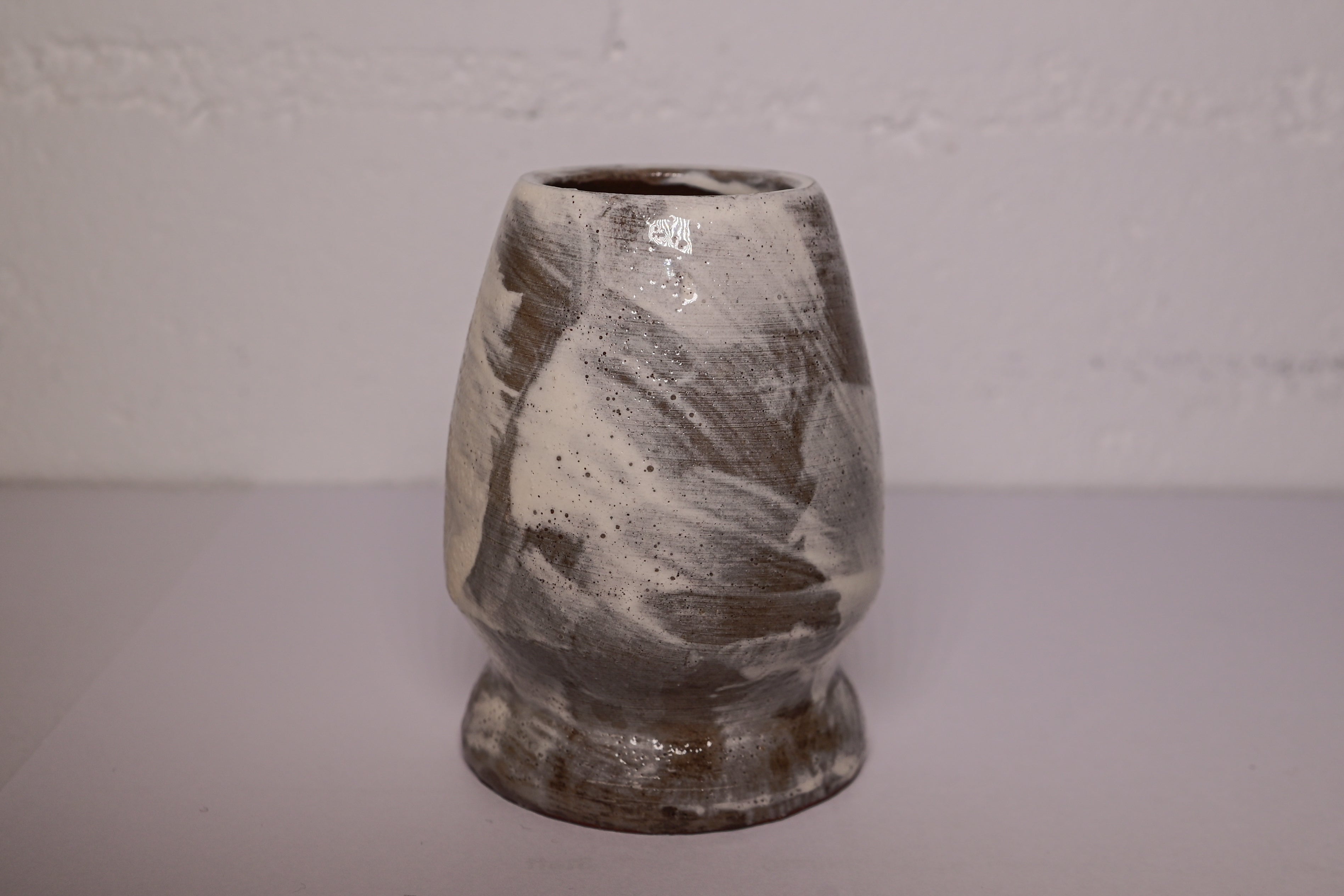 Chasen holder Hakeme | Ado Studio